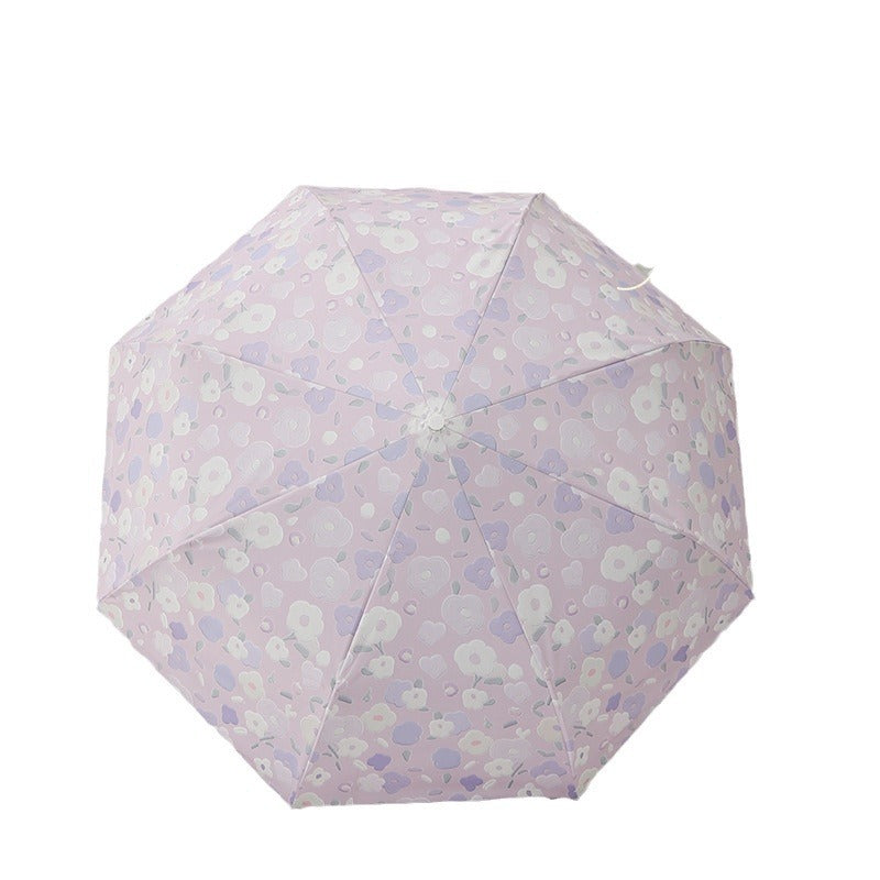 Dame sammenleggbar paraply med stilfullt blomstedesign Luvikno
