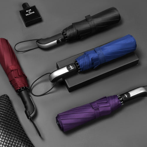 Kvinnelig sammenleggbar paraply med ergonomisk og elegant håndtak Luvikno