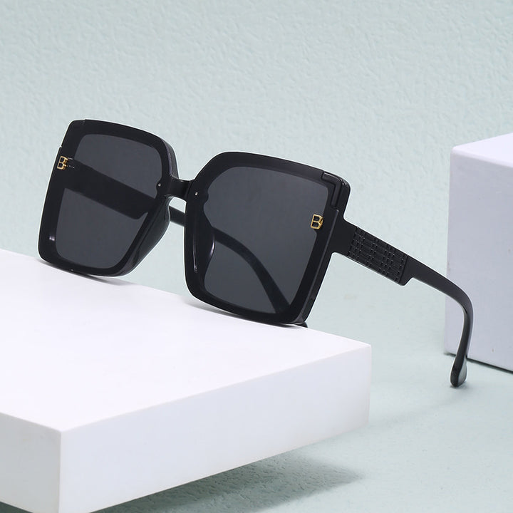 Dame fashionable square solbriller med strukturert bøyledesign Luvikno