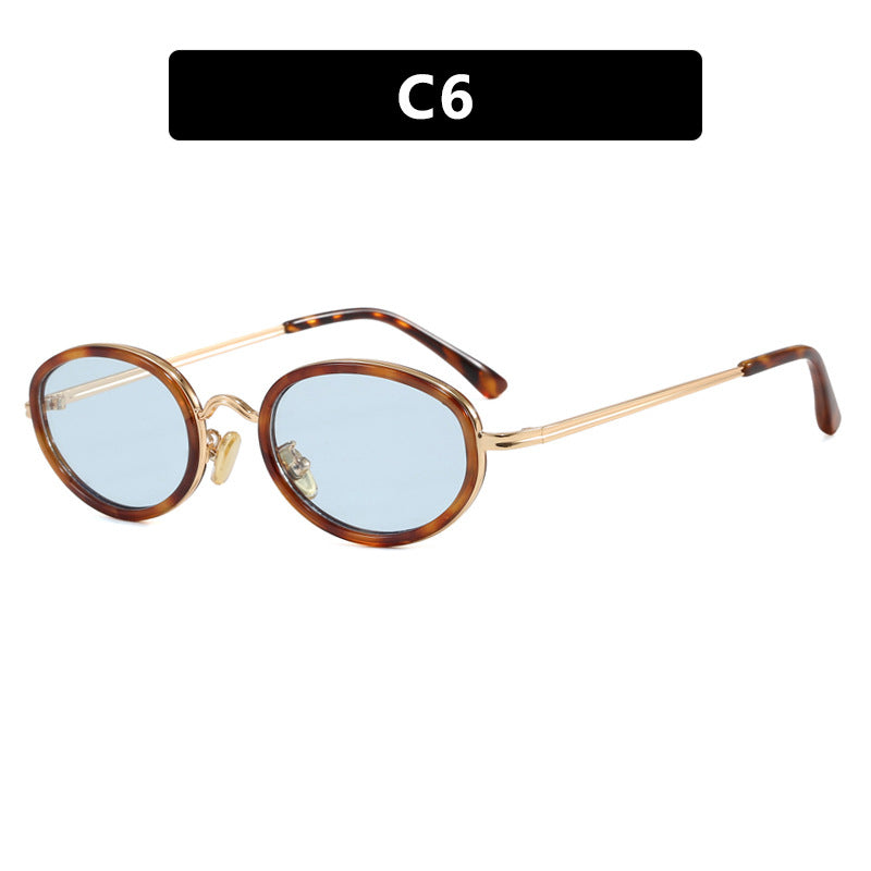 Dame elegant rund solbrille med moderne metallramme Luvikno