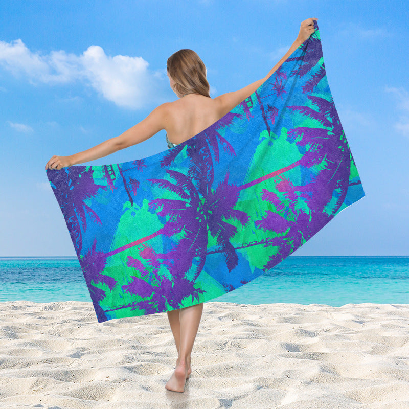Women's beach towel with vibrant palm motif Luvikno