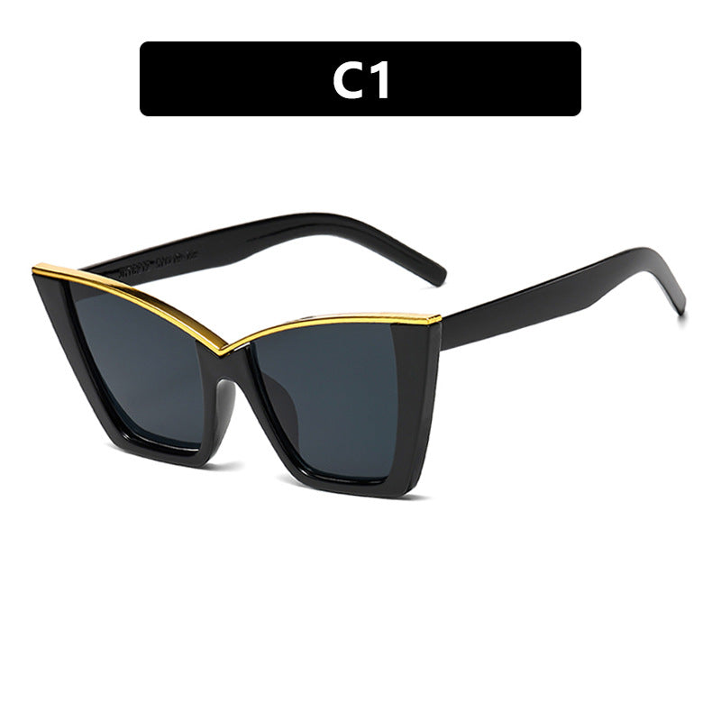 Dame ekstravagant solbrille med unik design og gullige aksenter Luvikno