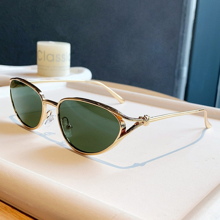 Dame Cat-Eye solbriller med elegant gullramme og polarisert glass Luvikno
