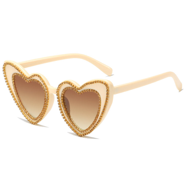 Dame hjerteformet solbrille med glitrende detaljer Luvikno
