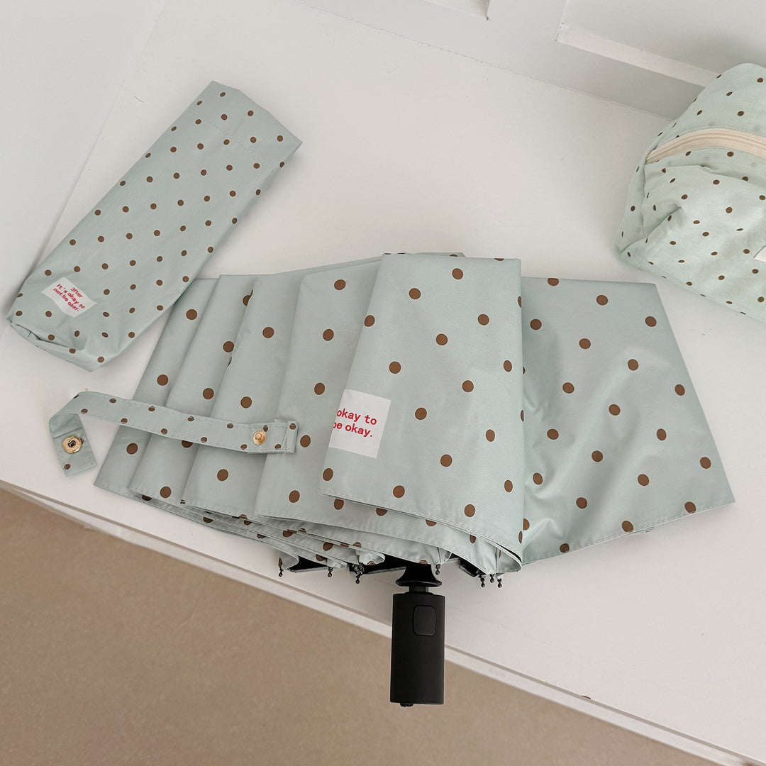 Dame sammenfoldbar paraply med praktisk knappmekanisme og stilfull prikkedesign Luvikno