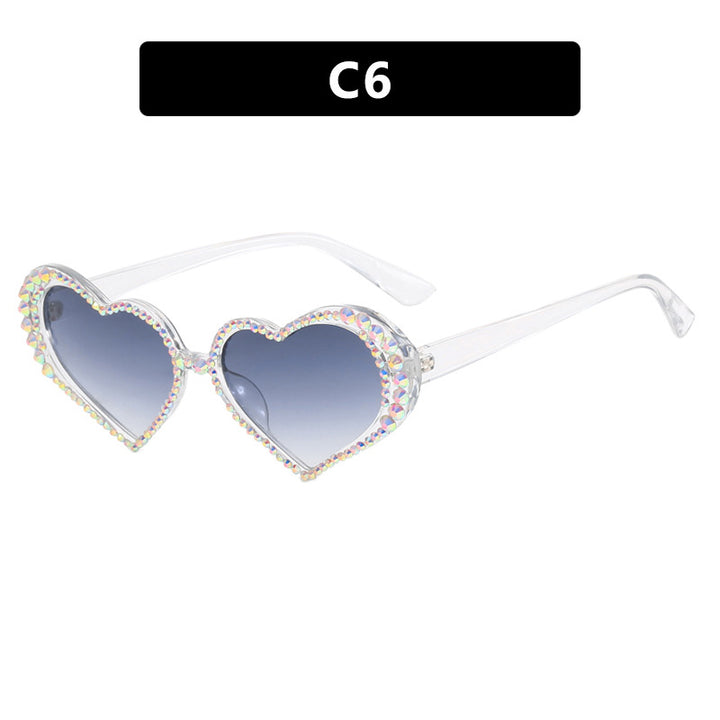 Dame hjerteformet solbrille med strassbesatt ramme Luvikno