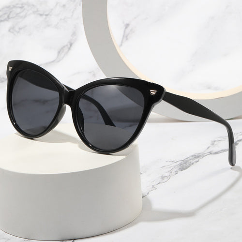 Dame moteriktige Cat-Eye solbriller med gjennomsiktig ramme og blå linser Luvikno