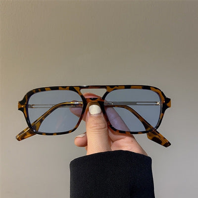 Dame trendy kvadratiske solbriller med transparent ramme og myke linser Luvikno