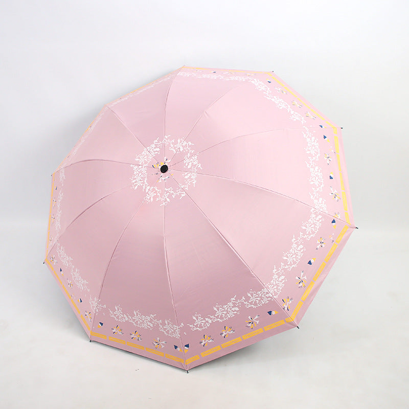 Kvinnens elegante sammenleggbare paraply med blomsterdesign Luvikno