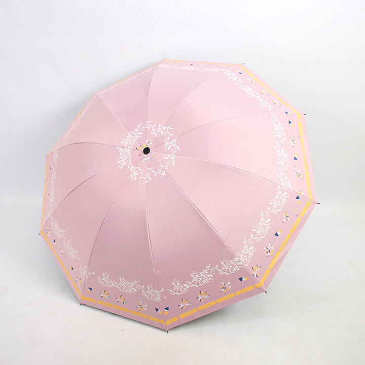 Kvinnens elegante sammenleggbare paraply med blomsterdesign Luvikno