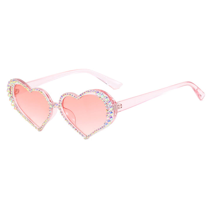 Dame hjerteformet solbrille med strassbesatt ramme Luvikno