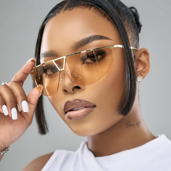Dame futuristisk solbrille med beskyttende metallramme Luvikno