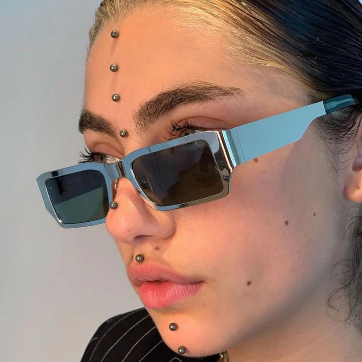 Dame geometrisk solbrille med beskyttende UV-filter og robust metallramme Luvikno