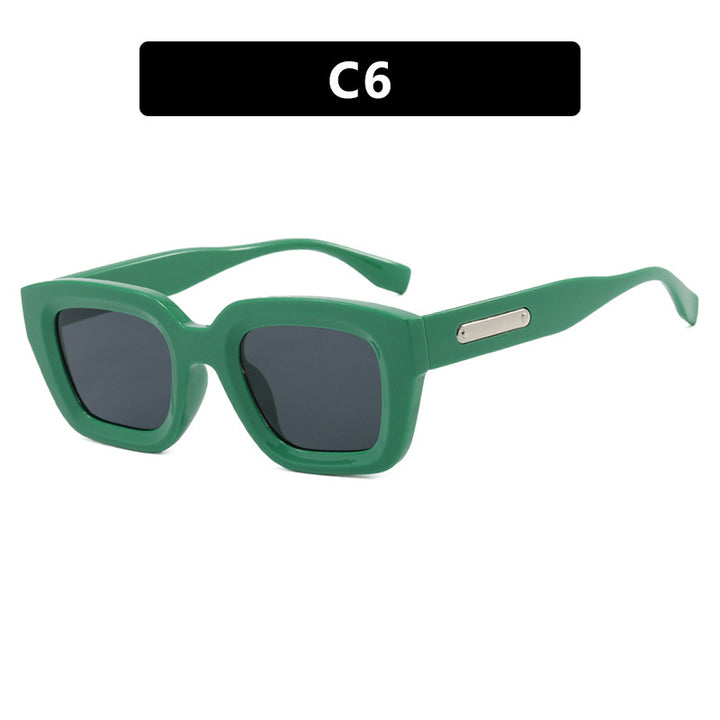 Dame kvadratisk solbrille med gjennomsiktig ramme og brune glass Luvikno