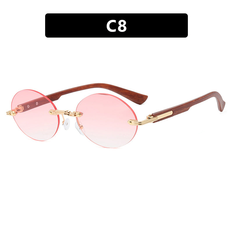 Dame rund solbrille med elegant treinnramme og UV-beskyttelse Luvikno