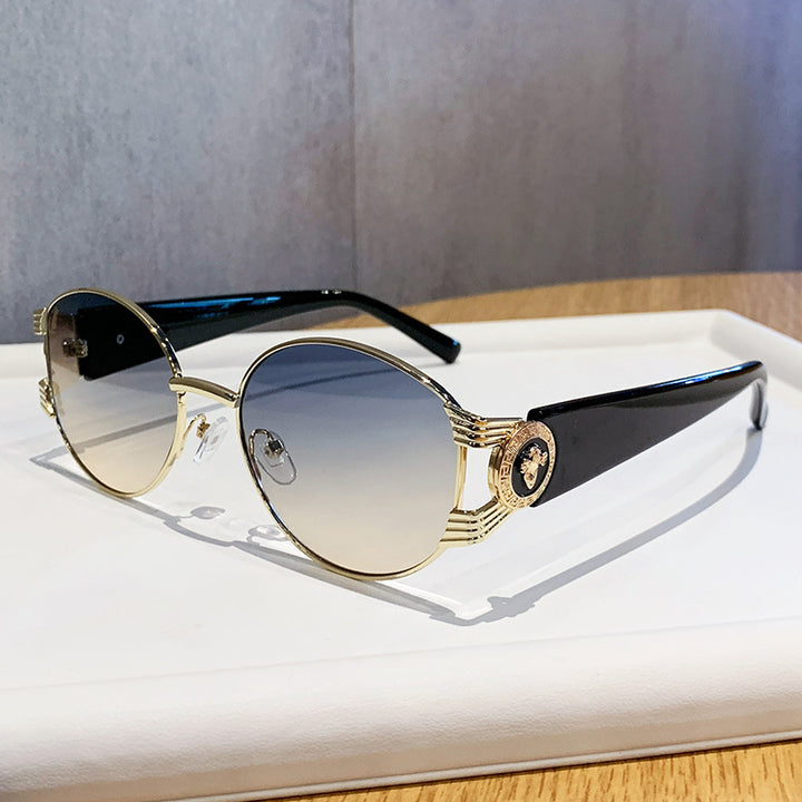 Dame elegant solbrille med luksuriøs metallramme og speilte glass Luvikno