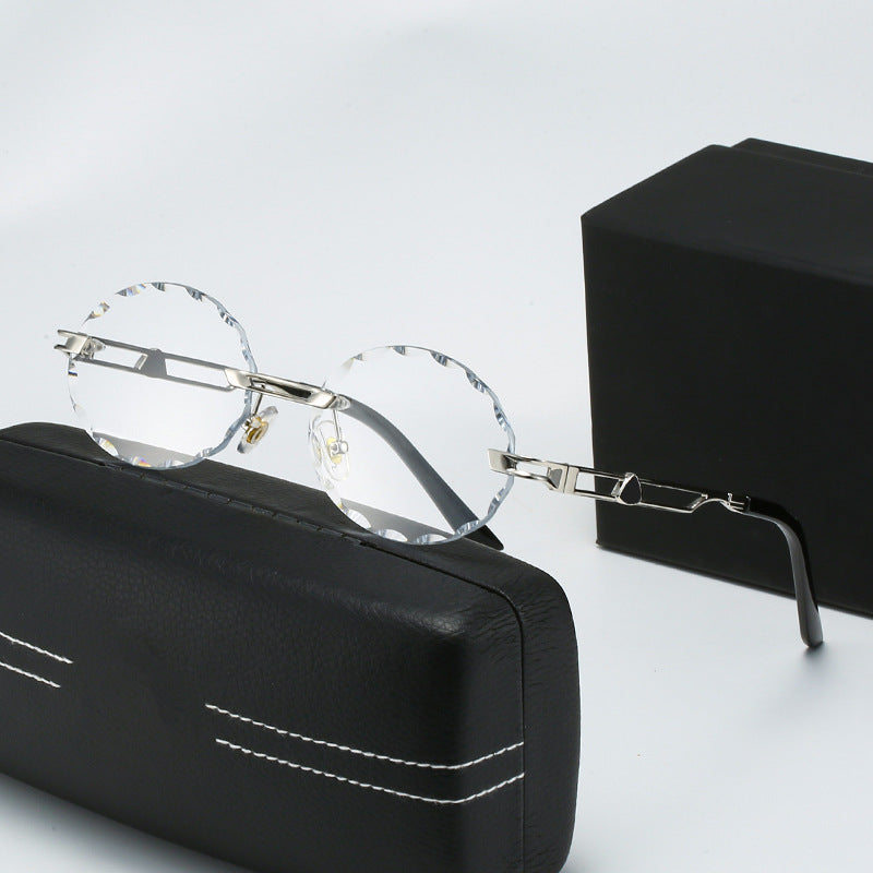 Dame rund solbrille med unikt bølgedesign og høykvalitets metallramme Luvikno