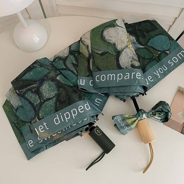 Damer sammenleggbart paraply med florale accenter Luvikno
