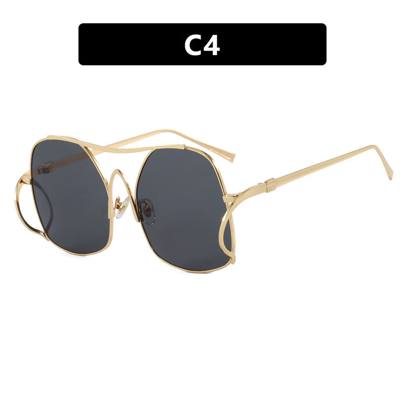 Dame geometrisk solbrille med smal metallramme og brune glass Luvikno