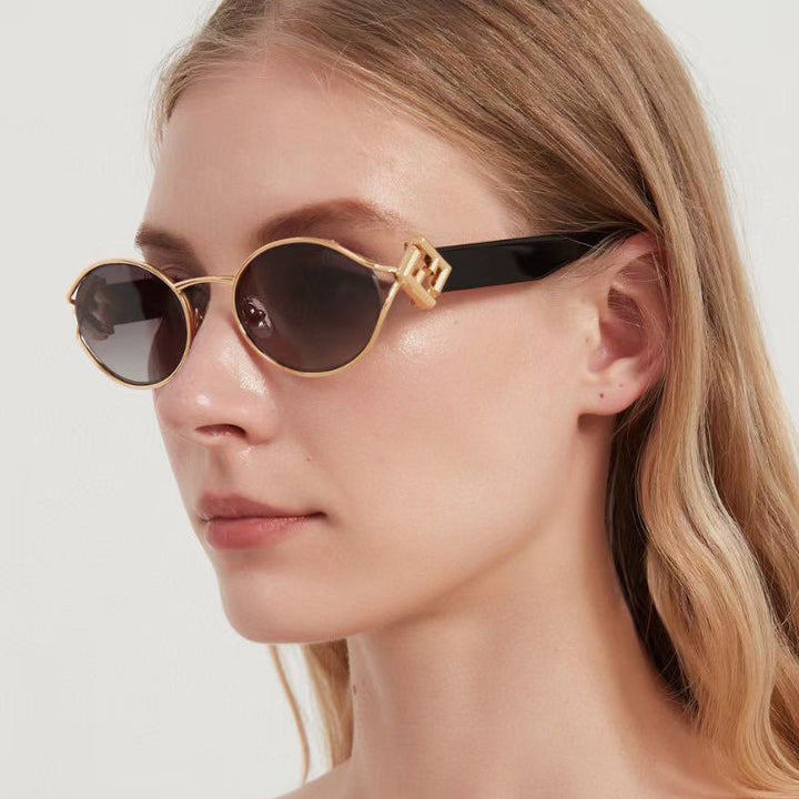 Dame moter solbrille med elegant metallramme og UV-beskyttelse Luvikno