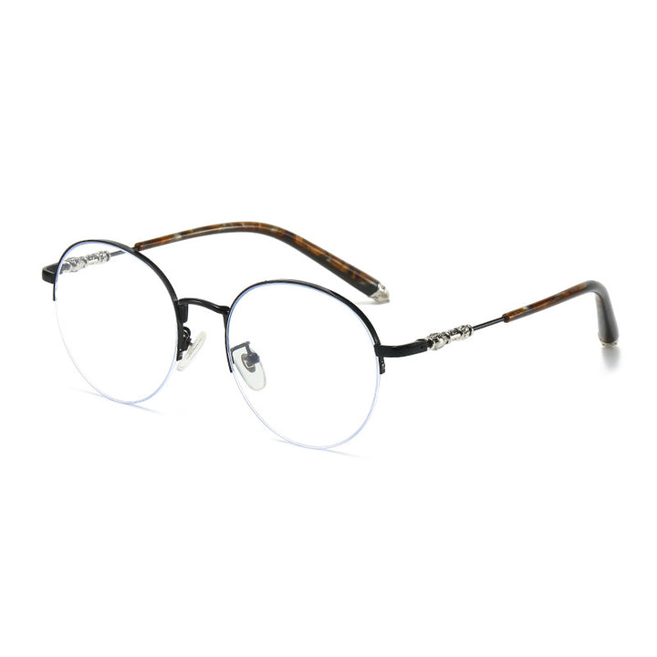 Dame rund solbrille med elegant metallramme og komfortable nesepads Luvikno