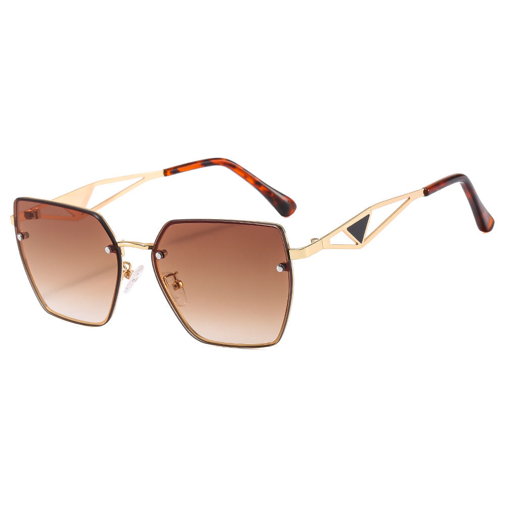 Dame geometrisk solbrille med filigran design Luvikno