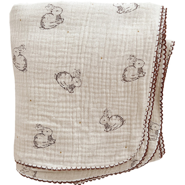 Unisex Musselinteppe med delikat blomsterdesign og elegante volanger Luvikno
