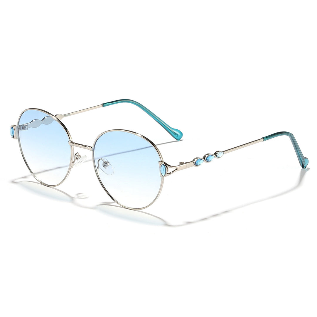 Dame rund solbrille med elegant metallramme og speilvendte glass Luvikno