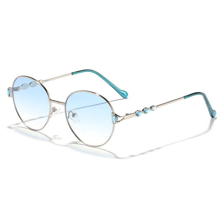 Dame rund solbrille med elegant metallramme og speilvendte glass Luvikno