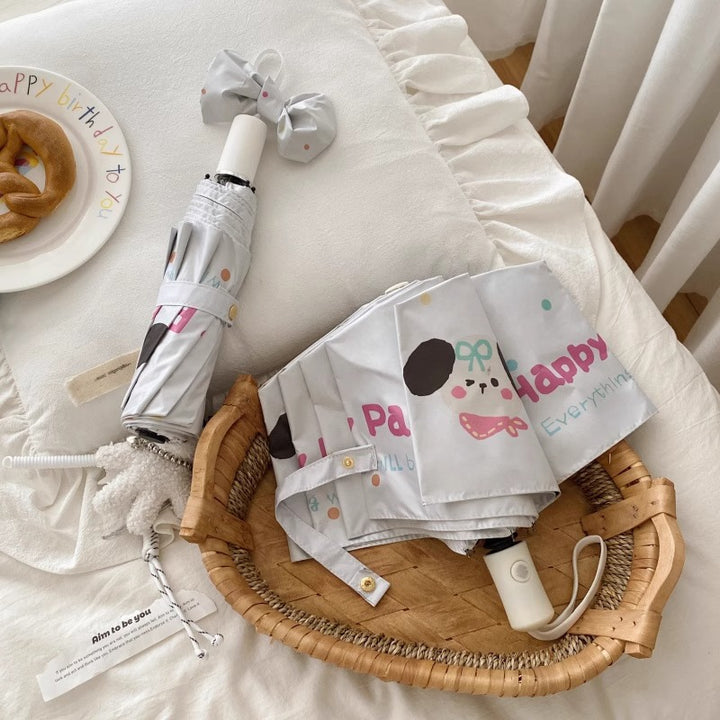 Dame Faltregnparaply med kreativt tegneserie-design Luvikno