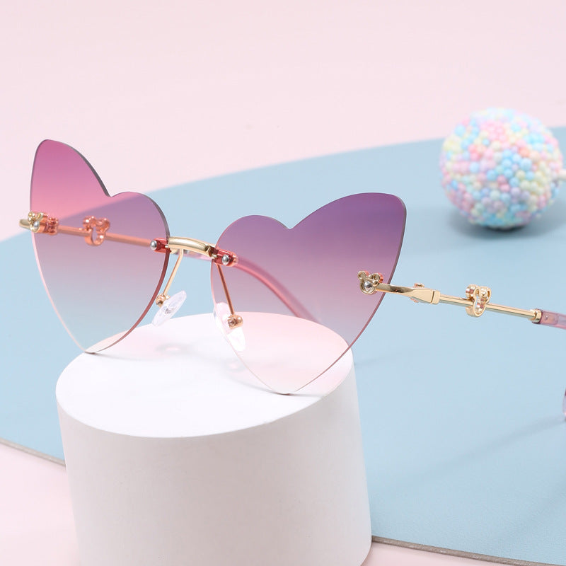 Damer hjerteformet solbrille med dekorert ramme Luvikno