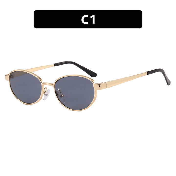 Dame moteriktig solbrille i elegant oval design med ramme i høykvalitets metall Luvikno