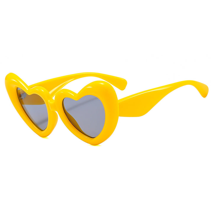 Dame Hjerteformet Solbrille med stilfull innramming Luvikno