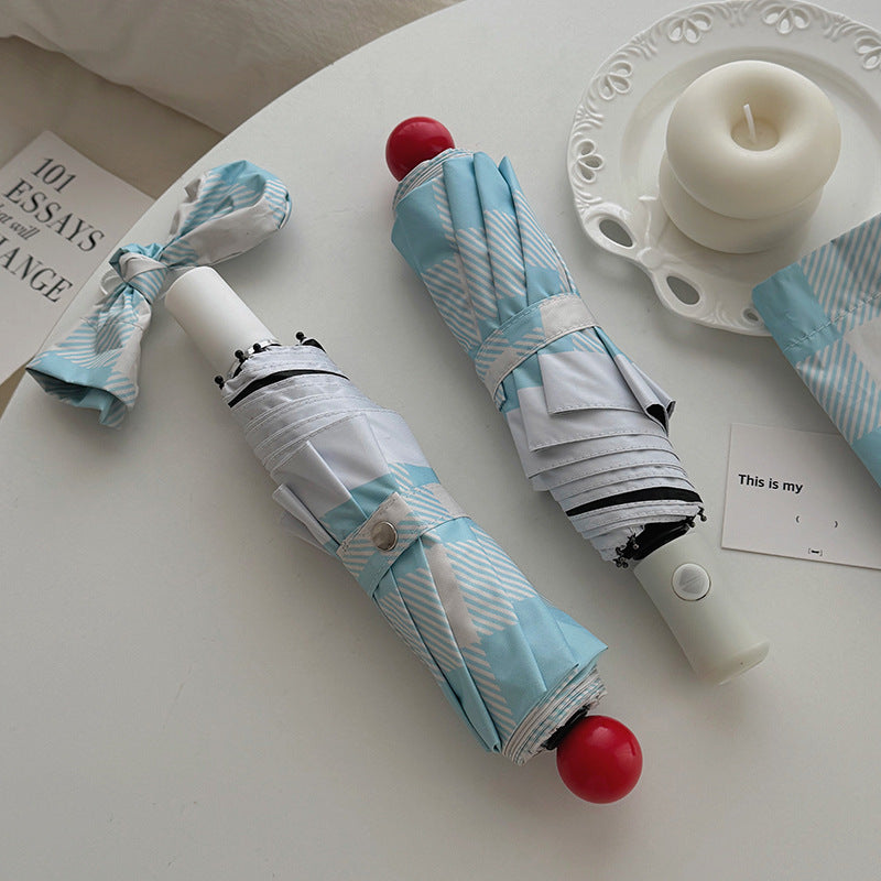 Dame sammenleggbart paraply med spesiell design Luvikno
