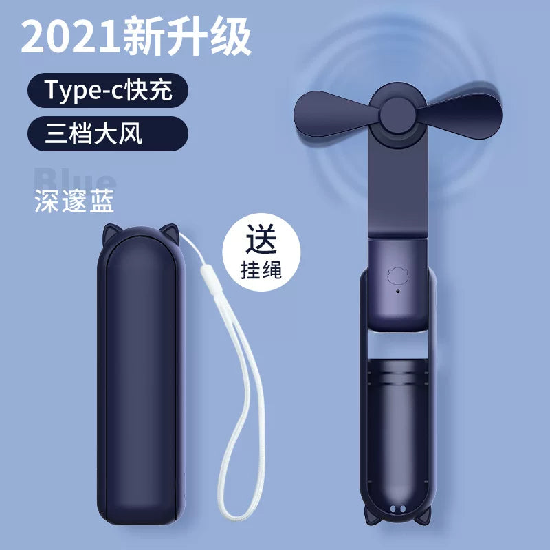 Unisex en størrelse sammenleggbar oppladbar trippel håndholdt mini vifte med innebygd powerbank USB-C og USB-A tilkoblinger samt håndleddsstropp Luvikno