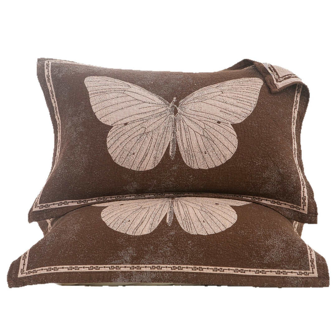 Dameputtpute med elegant sommerfugl design Luvikno