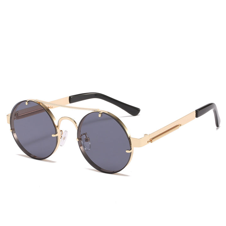 Dame rund designer solbrille med innovativ metallramme og beskyttende linser Luvikno