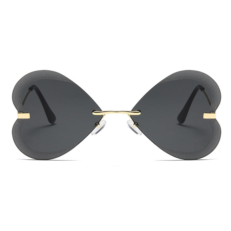 Kvinnelige hjerteformede solbriller i trendy design Luvikno