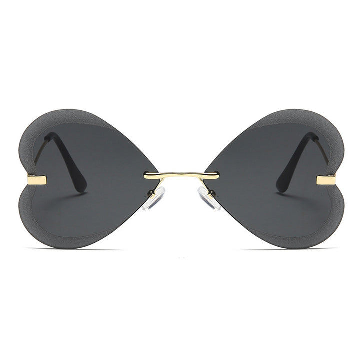 Kvinnelige hjerteformede solbriller i trendy design Luvikno