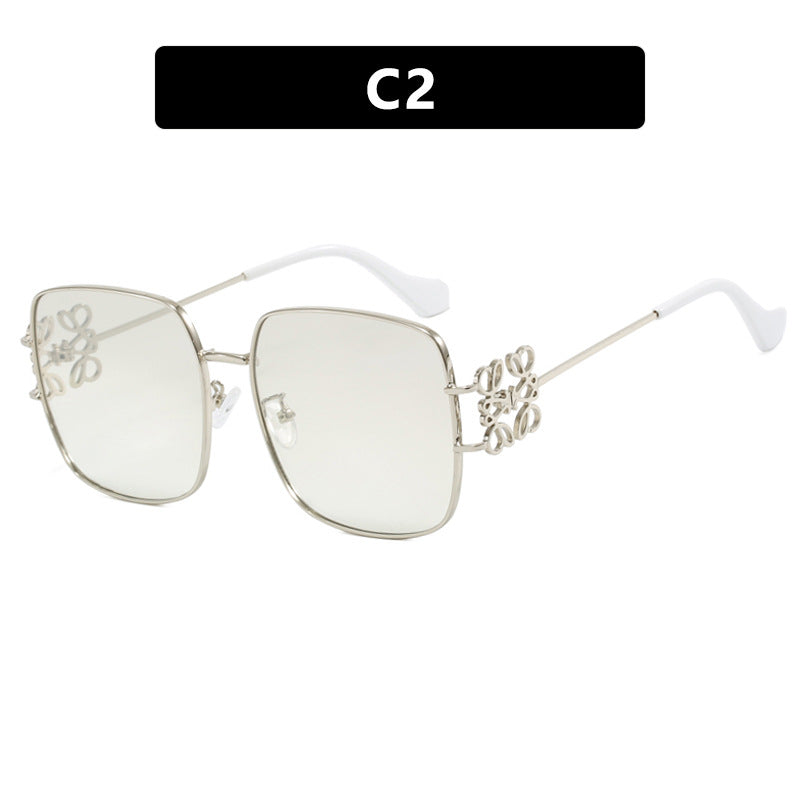 Dame kvadratisk solbrille med filigran design og luksuriøs metallramme Luvikno