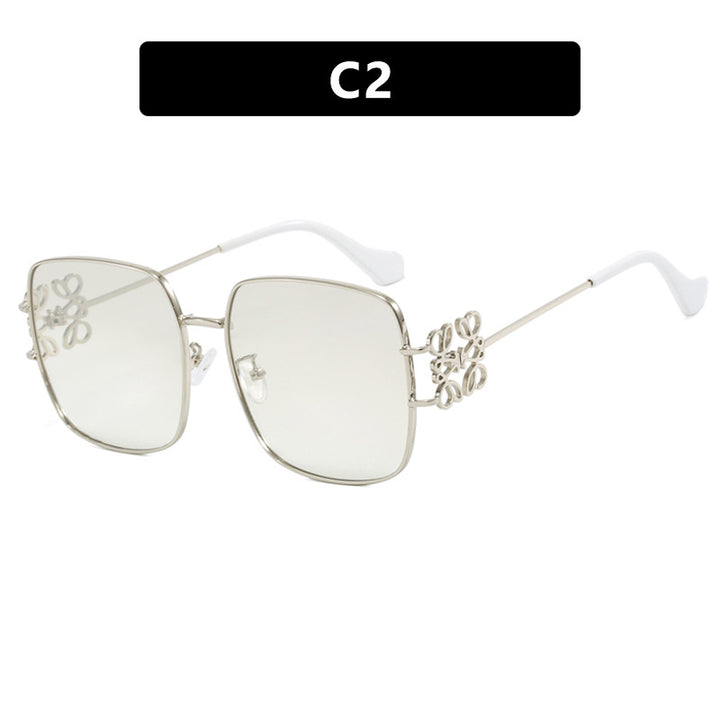 Dame kvadratisk solbrille med filigran design og luksuriøs metallramme Luvikno