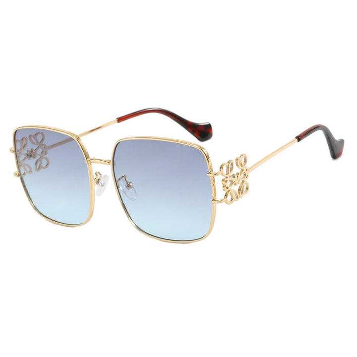 Dame kvadratisk solbrille med filigran design og luksuriøs metallramme Luvikno