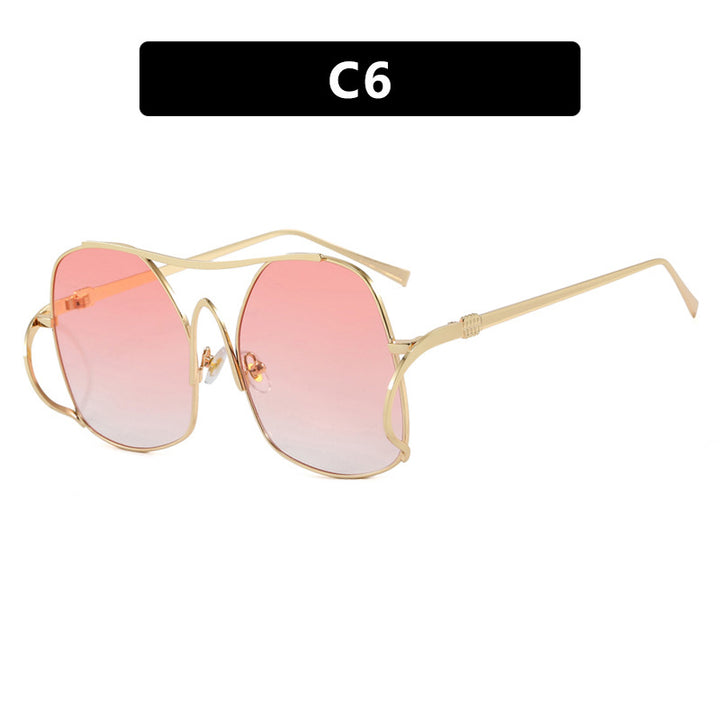 Dame geometrisk solbrille med smal metallramme og brune glass Luvikno