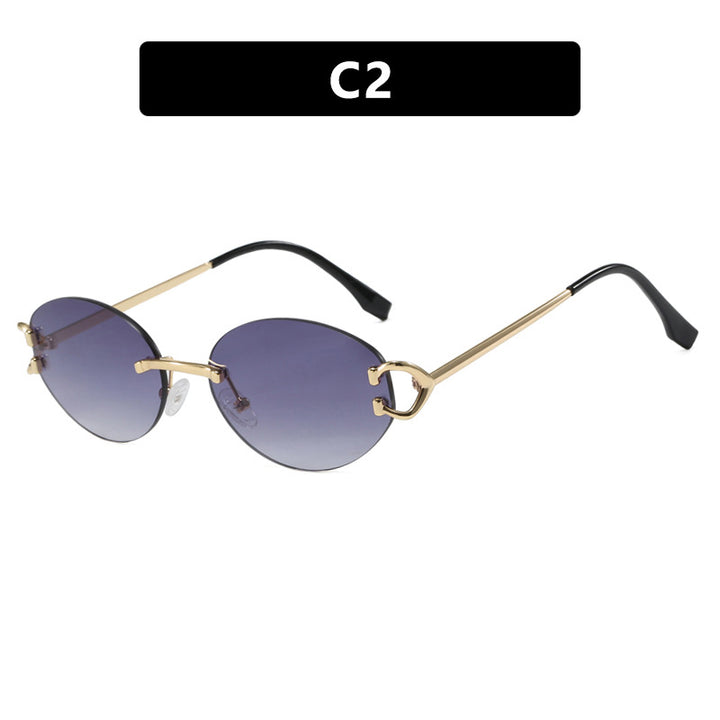 Dame elegant ovalformet solbrille med moderne metalramme Luvikno