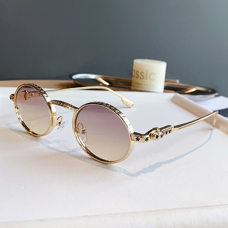 Dame Elegant solbrille med filigran detaljer Luvikno