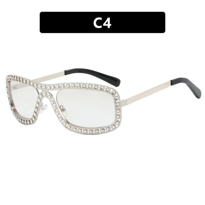 Dame moteriktig solbrille med glitrende ramme Luvikno