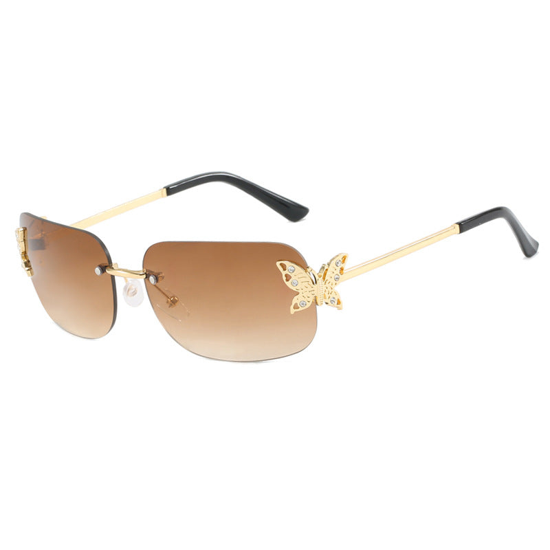 Dame moteriktig solbrille med filigran sommerfugldesign og beskyttende glass Luvikno
