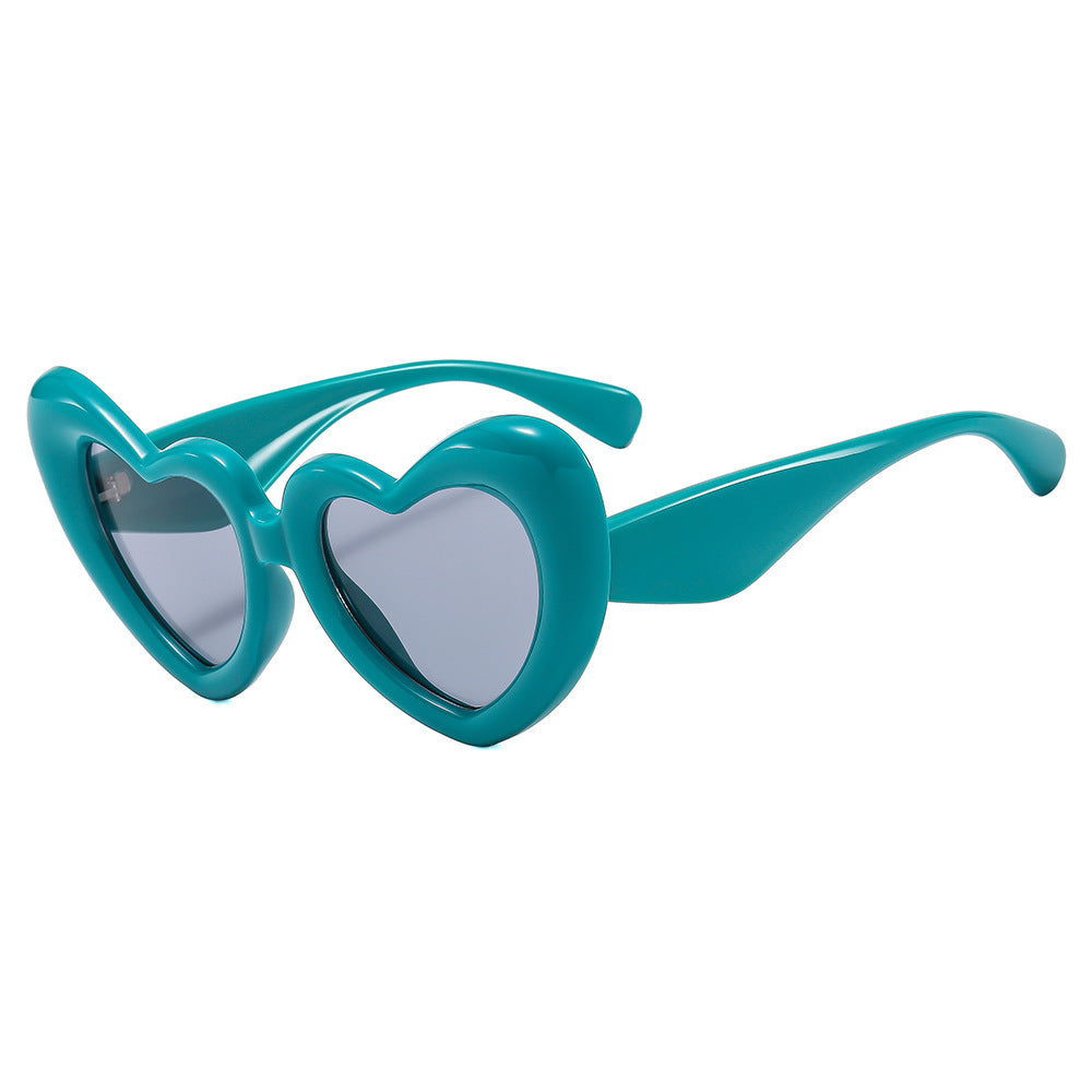 Dame Hjerteformet Solbrille med stilfull innramming Luvikno