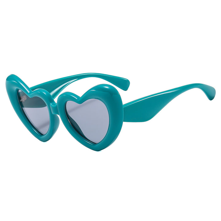 Dame Hjerteformet Solbrille med stilfull innramming Luvikno