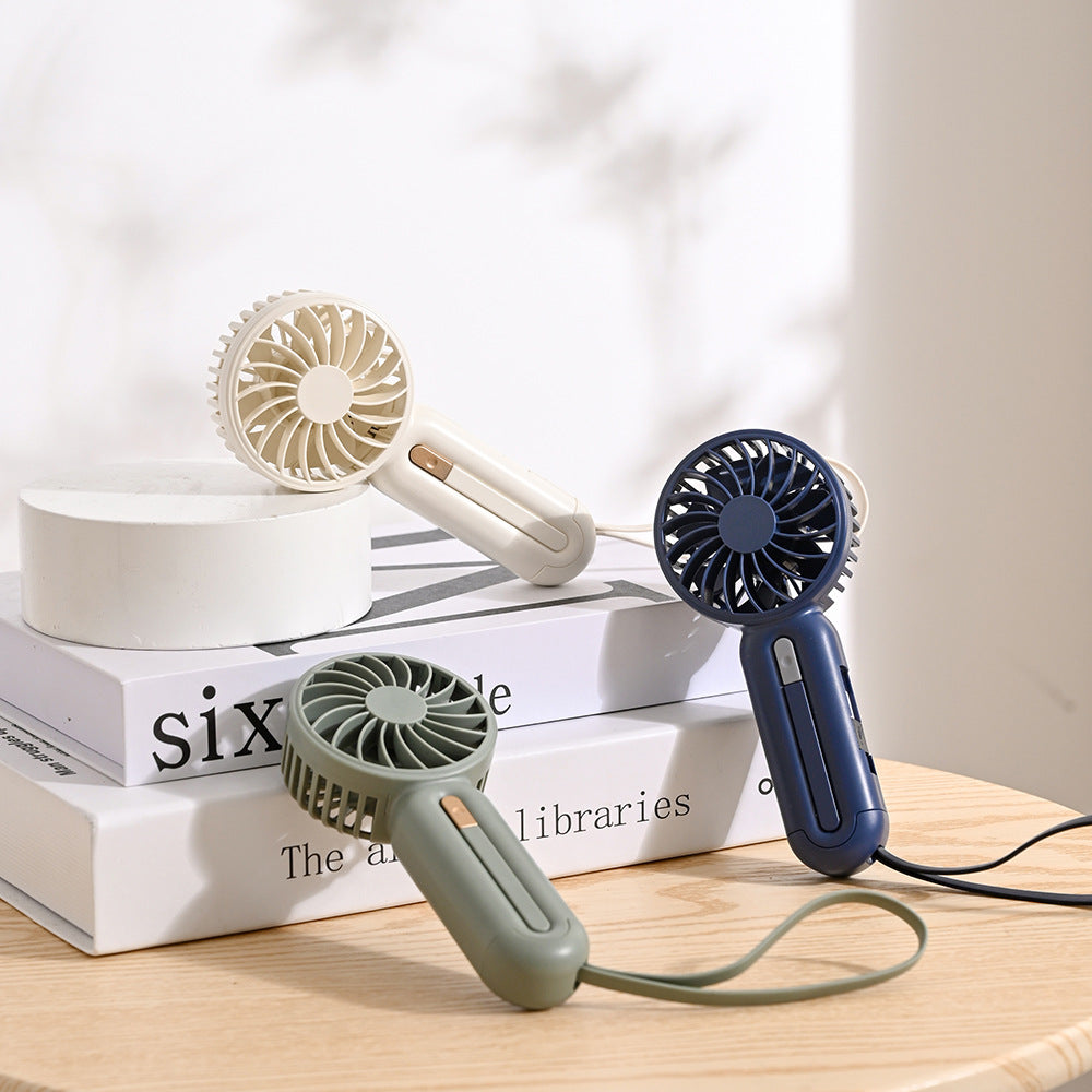 Unisex nan bærbar håndvifte med sammenleggbart håndtak, USB-ladingsfunksjon og bæreslynge Luvikno